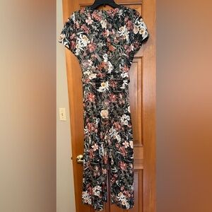 Cropped romper with self tie belt.